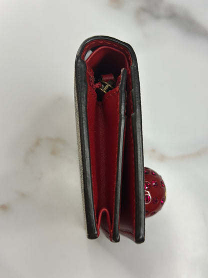 Pre-owned Gucci GG Supreme canvas bifold or compact wallet with a cherry embellishment.