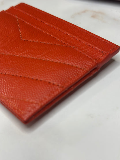 Pre-owned Saint Laurent orange-red grain de poudre card holder