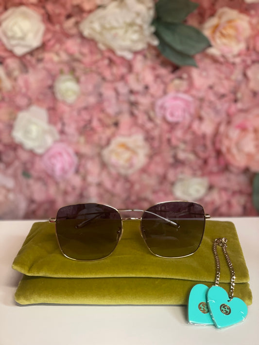 Pre-Owned Gucci sunglasses with heart charms