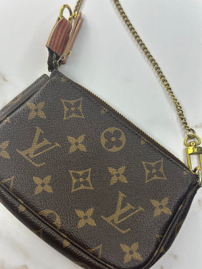 Pre-owned Louis Vuitton Monogram Trunks and Locks Mini Pochette Accessories