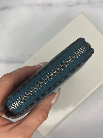 Pre-owned Givenchy dark teal leather zippy wallet